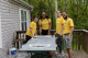 Approximately 50 ForColumbia volunteers served at the City of Refuge Shalom Center, a property gifted to this non-profit in 2024. The property includes a home used for transitional housing for refugees. These volunteers scraped and repainted the front door of the home, and installed an awning.